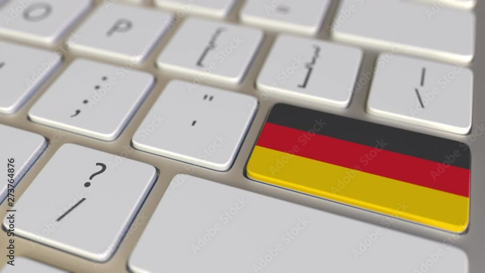 Poster key with flag of uruguay on the computer keyboard switches to key with flag of germany, translation 