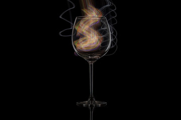 Wine glass on a black isolated background