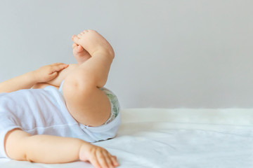 6-month kid feet. Little baby boy feet. Childhood, motherhood, life style upbringing concept