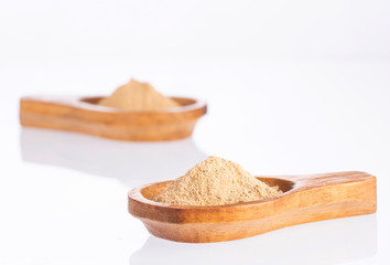 Organic maca powder - Lepidium meyenii. White background