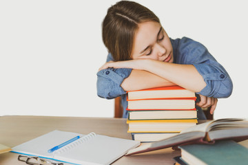 Stressed college student tired of hard learning with books in exams tests preparation, overwhelmed high school teen girl exhausted with difficult studies or too much homework, cram concept
