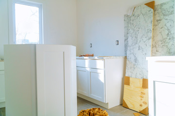 Preparing to install custom new in modern kitchen