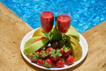 Delicious fresh fruits and pool