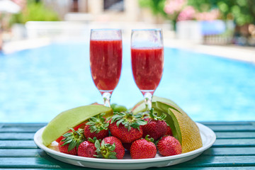 Delicious fresh fruits and pool