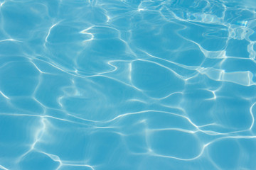 Naklejka na ściany i meble Light blue water pool texture