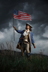 American revolution war soldier with flag of colonies over dramatic landscape. 4 july independence...
