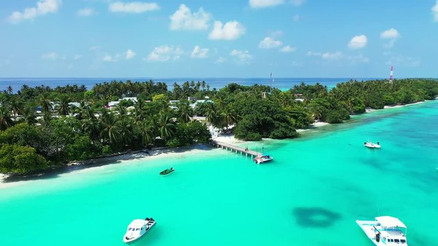 Perfect Birds Eye View of a Boat Harbour, along side this Beautiful Tropical Island in Thailand.