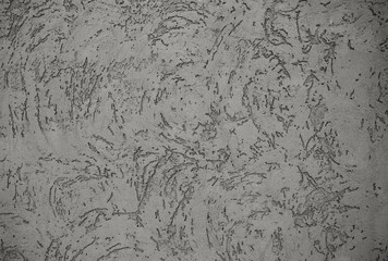 Raw gray cement wall with the many scratched pattern as abstract textured and background