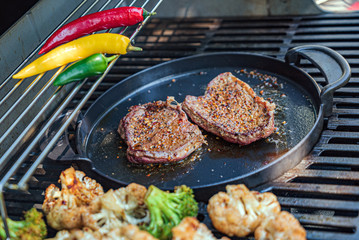 chef cooking grilled beef steak