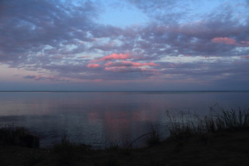 spring sea lake and blue sky and clouds sunset