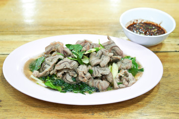 Boiled beef dip, Steamed entrails beef eating with spicy dip, selective focus.