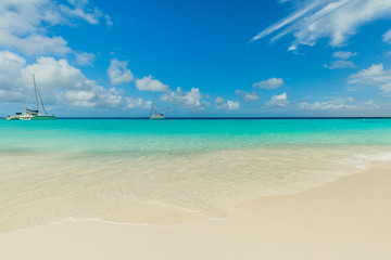 Fototapeta na wymiar Catamarans at the tropical beach of Curacao