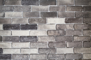 Black and Grey colour striped bricks on white concrete wall texture background, Interior decoration room concept