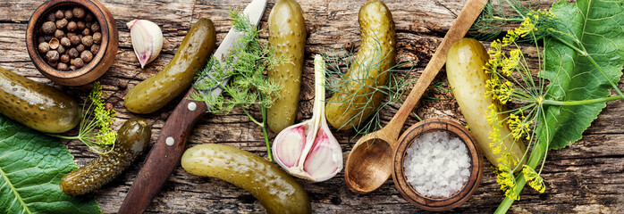 Homemade Pickles On Wooden Table