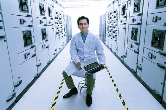 Technical personnel in the voltage room work