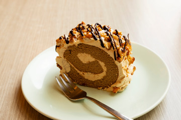 Coffee cake roll on a wooden table
