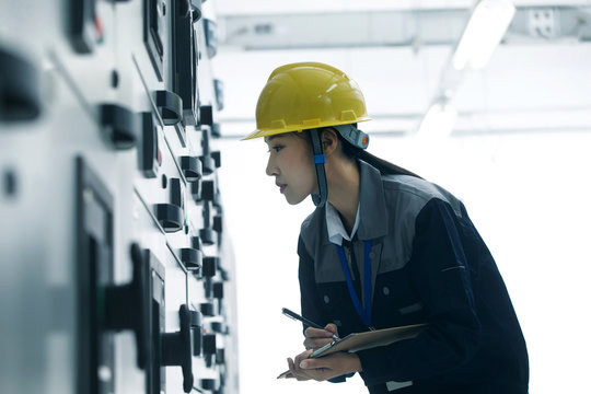Technicians work in a factory