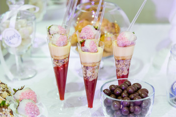 Fresh sweets on a banquet table in the restaurant.