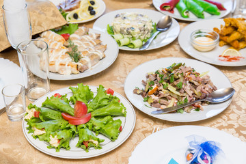 Dishes on a served banquet table  in restaurant