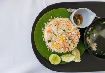 Crab meat fried rice of thai food with fry egg, vegetable and soup