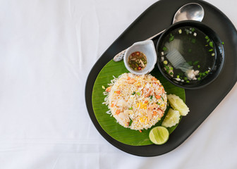 Crab meat fried rice of thai food with fry egg, vegetable and soup