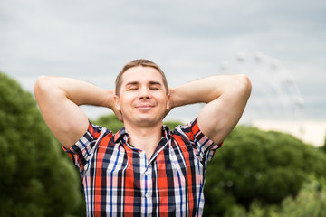 Naklejka premium Portrait of handsome young man on vacation