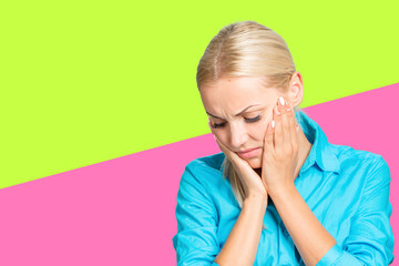 Woman suffering from toothache, tooth decay or sensitivity