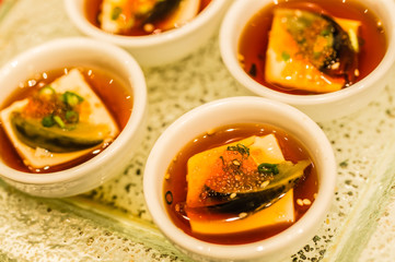 asia style tofu soup dessert in small bowl display set