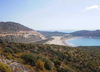 Obraz premium Beautiful summer seascape. Mountain coast of the blue sea. Rocks and forest near the ocean coast.