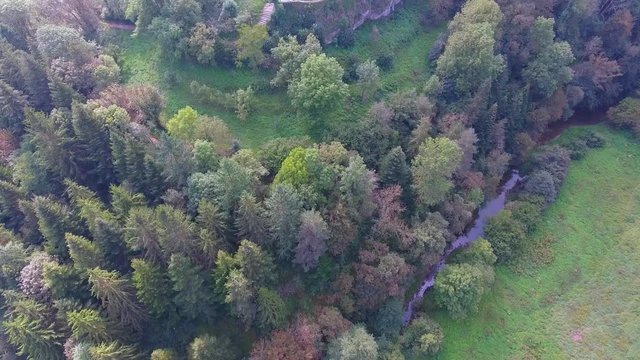 Church of Santa Magdalena in Rupit is surrounded by a forest full of colorful trees. Barcelona province, Catalonia, Spain.