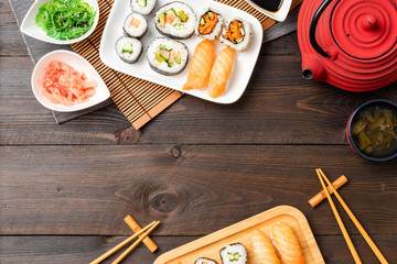 Japanese sushi on woden background. Top view