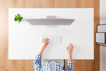 Woman working on computer. Office desktop