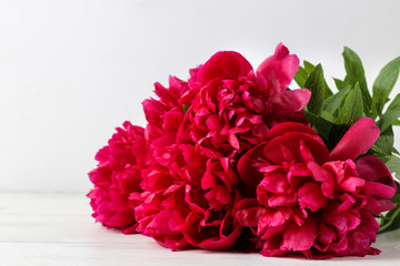 bouquet Beautiful bright pink flowers peonies on a light background. close-up