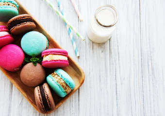 Colorful macaroons and milk