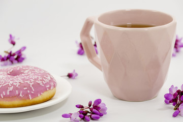 Composition of tea with donuts