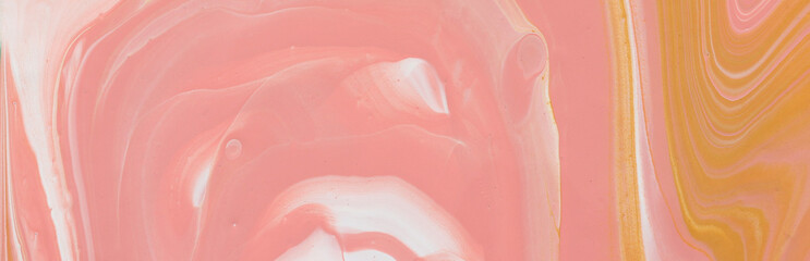 photography of abstract marbleized effect background. gold, yellow, orange and white creative colors. Beautiful paint