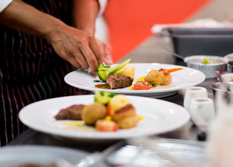 Chef preparing food in the kitchen, chef cooking, Chef decorating dish