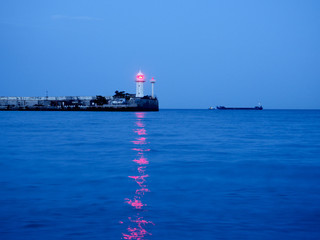 lighthouse at sunset in the twilight in clear weather in Crimea