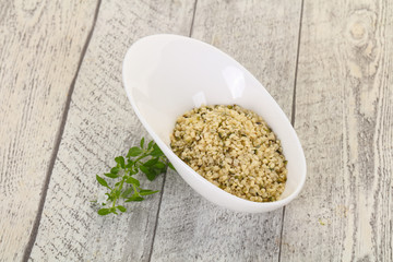 Peeled hemp seeds in the bowl