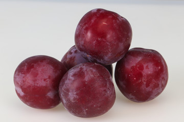 Sweet ripe plum isolated on white