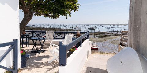 typical cabins at Cap Ferret on Arcachon Basin with sea view in France  in web template banner web