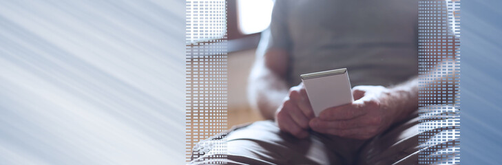 Man using his smartphone. panoramic banner