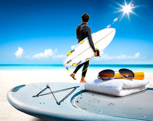 Surfer board of free space for your decoration and summer time. Sunny warm day and ocean landscape. 