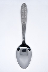 Retro style spoon isolated on white