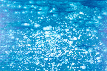 wooden board painted with Blur sea water on sunny day effect. Blue bokeh on water with blurred effect. Summer background.