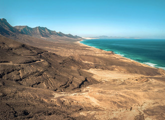 Beautiful valley panoramic view on the ocean coastline near moun