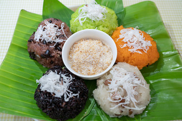 Colorful of sticky rice or Xoi on banana leaf with sesame salt. Famous street food for breakfast or fast foot in Vietnam. traditional foot. Royalty high quality free stock image. beautiful sticky rice