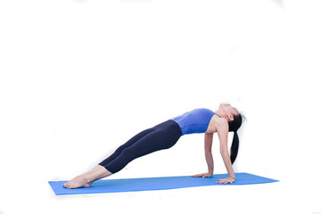 Beautiful Asia girl practicing yoga on isolated white background : Concept practicing