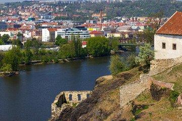 Fototapeta na wymiar Ruins of Vysehrad castle and new buildings in Prague