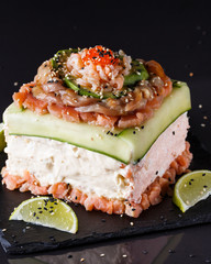 Piece of traditional savory swedish sandwich cake Smorgastorta